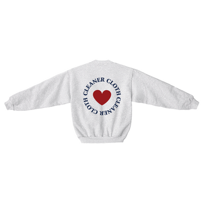 White sweatshirt with a red heart and text on the back against a white background